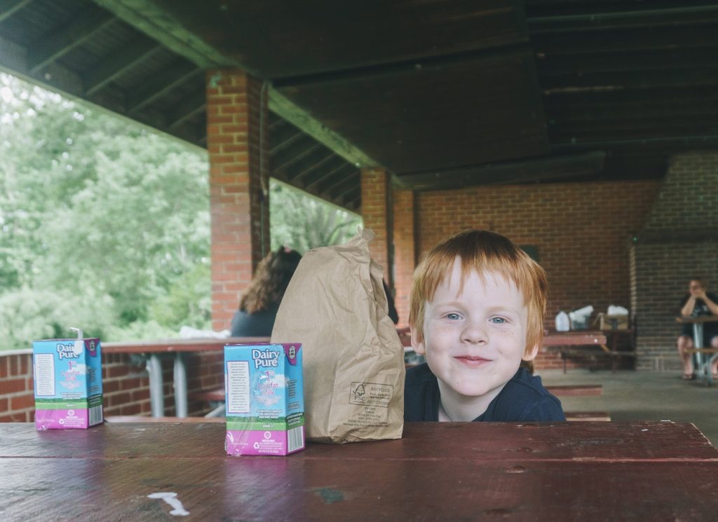 Boy Enjoys Summer Lunch